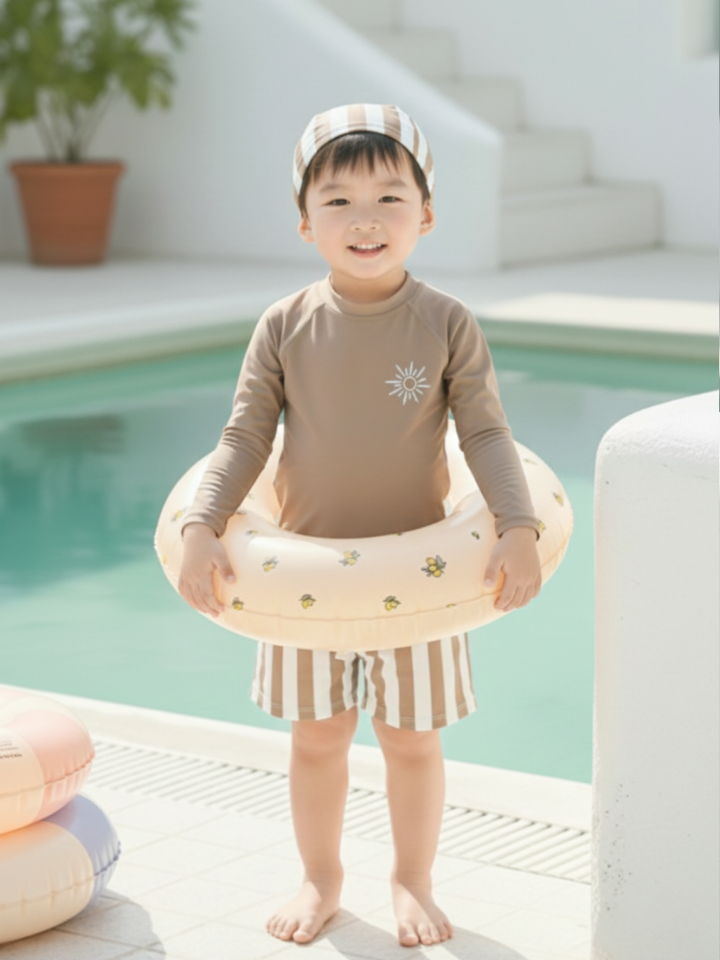 Unisex long-sleeve kids swimwear set by Pink N’ Proper