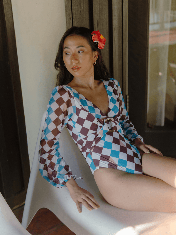 TROPICAL OPULENCE Dune Plunge Mesh Long Sleeve Bare Back with Resin Buckle Swimsuit in Blue White - Pink N' Proper